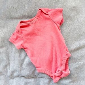 Pink bodysuit onesie